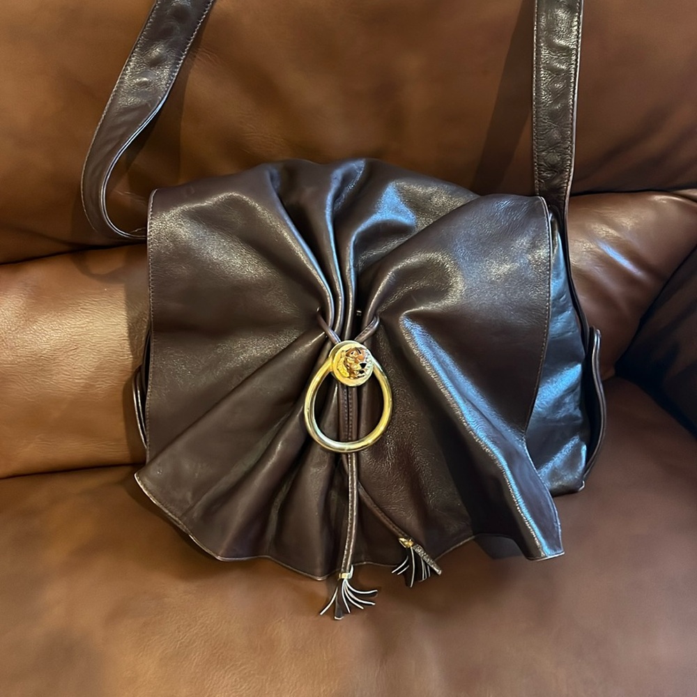 Vintage Gucci, brown leather shoulder bag hippie lion with gold